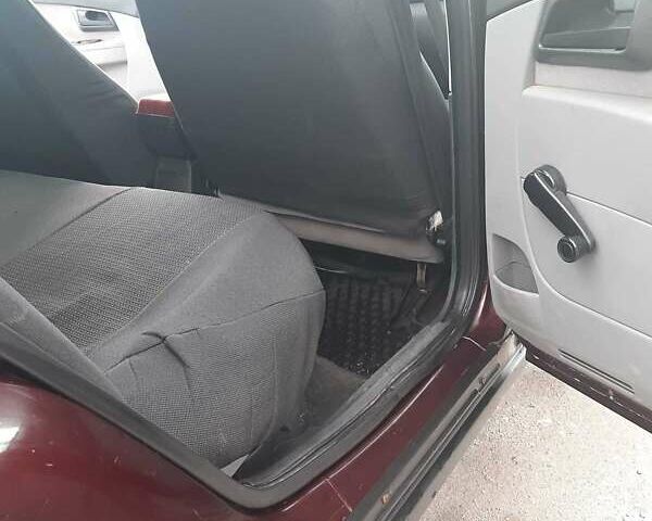 Красный ВАЗ 2170 Priora, объемом двигателя 1.6 л и пробегом 207 тыс. км за 2600 $, фото 9 на Automoto.ua