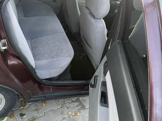 Красный ВАЗ 2170 Priora, объемом двигателя 1.6 л и пробегом 777 тыс. км за 1850 $, фото 12 на Automoto.ua