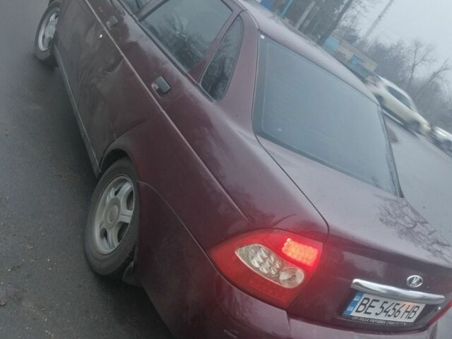 Красный ВАЗ 2170 Priora, объемом двигателя 1.6 л и пробегом 204 тыс. км за 1750 $, фото 7 на Automoto.ua