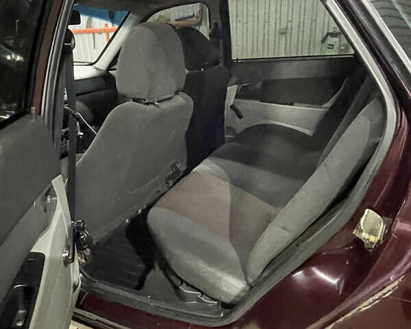 Красный ВАЗ 2170 Priora, объемом двигателя 1.6 л и пробегом 202 тыс. км за 1555 $, фото 9 на Automoto.ua