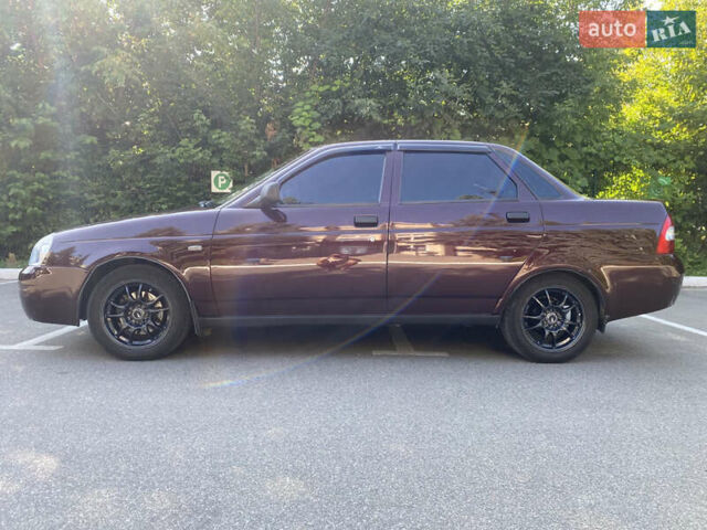 Красный ВАЗ 2170 Priora, объемом двигателя 1.6 л и пробегом 331 тыс. км за 4000 $, фото 4 на Automoto.ua