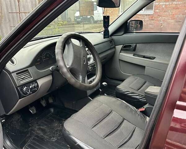 ВАЗ 2170 Priora 2008 в Лубнах на Automoto.ua Красный ВАЗ 2170 Priora, объемом двигателя 1.6 л и пробегом 200 тыс. км за 2300 $, фото 8 на Automoto.ua
