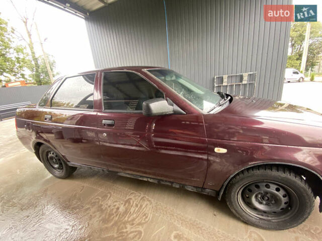 Красный ВАЗ 2170 Priora, объемом двигателя 1.6 л и пробегом 185 тыс. км за 2050 $, фото 10 на Automoto.ua