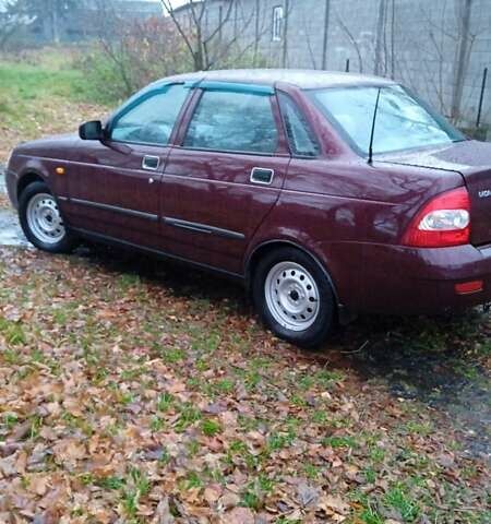 Красный ВАЗ 2170 Priora, объемом двигателя 1.6 л и пробегом 238 тыс. км за 1799 $, фото 1 на Automoto.ua