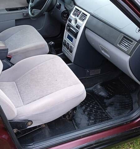 Красный ВАЗ 2170 Priora, объемом двигателя 1.6 л и пробегом 238 тыс. км за 1799 $, фото 14 на Automoto.ua