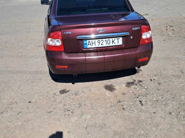 Красный ВАЗ 2170 Priora, объемом двигателя 1.6 л и пробегом 153 тыс. км за 2249 $, фото 1 на Automoto.ua