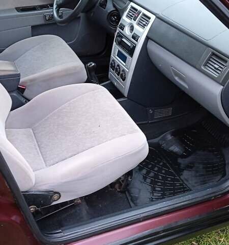 Красный ВАЗ 2170 Priora, объемом двигателя 1.6 л и пробегом 238 тыс. км за 1799 $, фото 10 на Automoto.ua