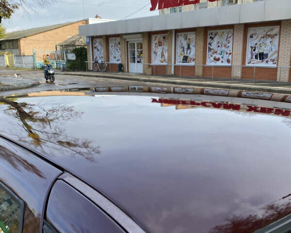 Красный ВАЗ 2170 Priora, объемом двигателя 1.6 л и пробегом 200 тыс. км за 2300 $, фото 6 на Automoto.ua