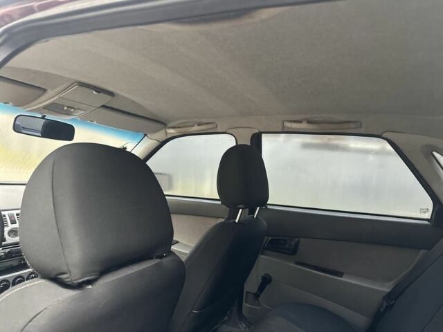 Красный ВАЗ 2170 Priora, объемом двигателя 1.6 л и пробегом 178 тыс. км за 1200 $, фото 7 на Automoto.ua