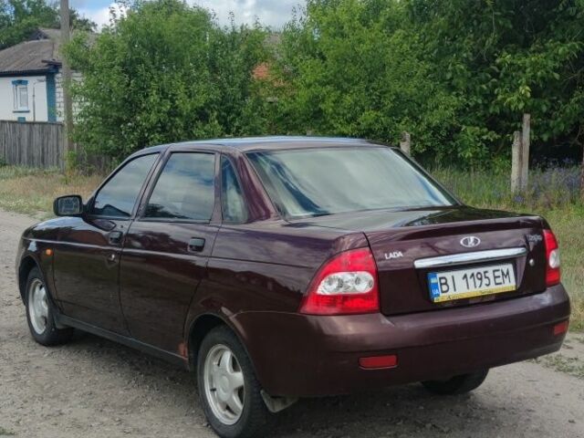 Красный ВАЗ 2170 Priora, объемом двигателя 1.6 л и пробегом 199 тыс. км за 1999 $, фото 3 на Automoto.ua