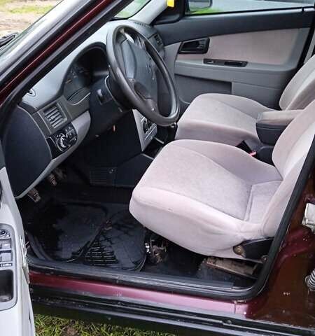 Красный ВАЗ 2170 Priora, объемом двигателя 1.6 л и пробегом 238 тыс. км за 1799 $, фото 13 на Automoto.ua