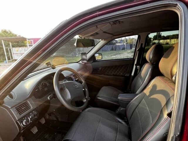 Красный ВАЗ 2170 Priora, объемом двигателя 1.6 л и пробегом 306 тыс. км за 2700 $, фото 5 на Automoto.ua