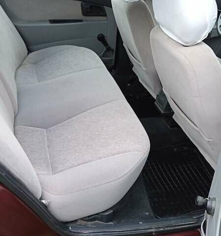 Красный ВАЗ 2170 Priora, объемом двигателя 1.6 л и пробегом 238 тыс. км за 1799 $, фото 11 на Automoto.ua