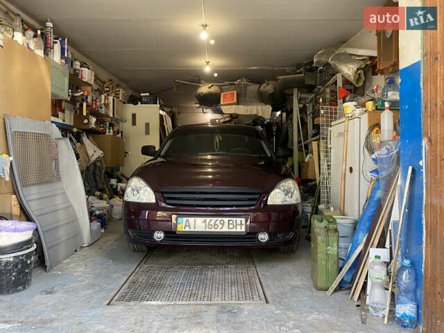 Красный ВАЗ 2170 Priora, объемом двигателя 1.6 л и пробегом 331 тыс. км за 4000 $, фото 39 на Automoto.ua