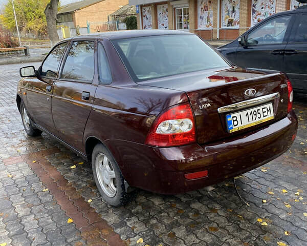 Красный ВАЗ 2170 Priora, объемом двигателя 1.6 л и пробегом 200 тыс. км за 2300 $, фото 5 на Automoto.ua