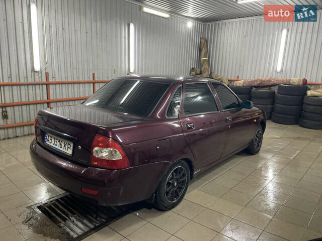 Красный ВАЗ 2170 Priora, объемом двигателя 1.6 л и пробегом 202 тыс. км за 1555 $, фото 1 на Automoto.ua