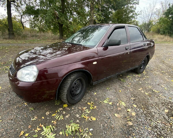 Красный ВАЗ 2170 Priora, объемом двигателя 1.6 л и пробегом 185 тыс. км за 2050 $, фото 2 на Automoto.ua