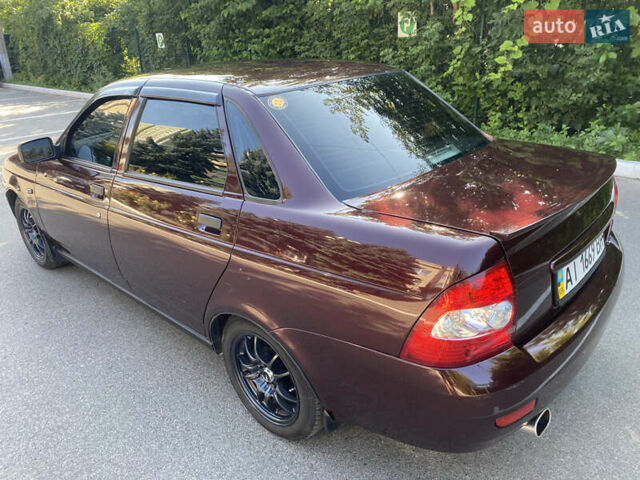 Красный ВАЗ 2170 Priora, объемом двигателя 1.6 л и пробегом 331 тыс. км за 4000 $, фото 11 на Automoto.ua