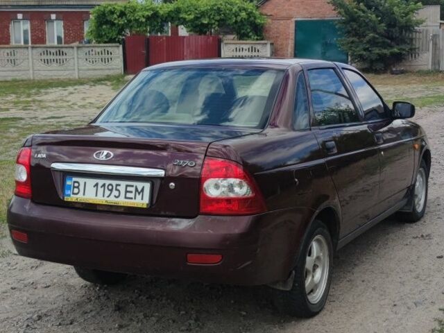 Красный ВАЗ 2170 Priora, объемом двигателя 1.6 л и пробегом 199 тыс. км за 1999 $, фото 2 на Automoto.ua