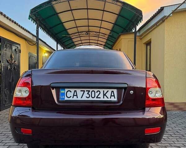 Красный ВАЗ 2170 Priora, объемом двигателя 1.6 л и пробегом 110 тыс. км за 2600 $, фото 11 на Automoto.ua