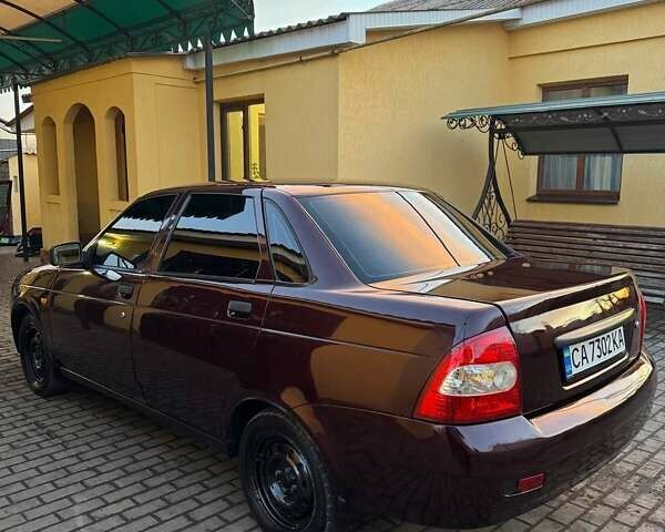 Красный ВАЗ 2170 Priora, объемом двигателя 1.6 л и пробегом 110 тыс. км за 2600 $, фото 9 на Automoto.ua