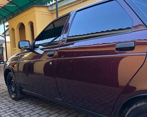 Красный ВАЗ 2170 Priora, объемом двигателя 1.6 л и пробегом 110 тыс. км за 2600 $, фото 7 на Automoto.ua