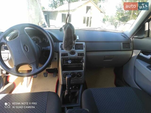 Красный ВАЗ 2170 Priora, объемом двигателя 1.6 л и пробегом 104 тыс. км за 3300 $, фото 9 на Automoto.ua