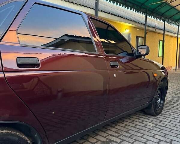 Красный ВАЗ 2170 Priora, объемом двигателя 1.6 л и пробегом 110 тыс. км за 2600 $, фото 13 на Automoto.ua