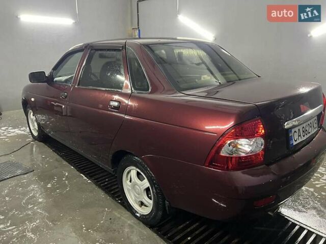Красный ВАЗ 2170 Priora, объемом двигателя 1.6 л и пробегом 270 тыс. км за 1999 $, фото 4 на Automoto.ua