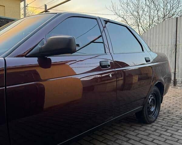 Красный ВАЗ 2170 Priora, объемом двигателя 1.6 л и пробегом 110 тыс. км за 2600 $, фото 4 на Automoto.ua
