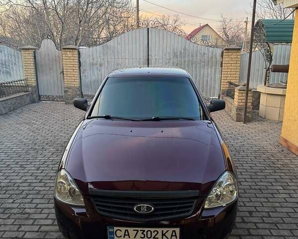 Красный ВАЗ 2170 Priora, объемом двигателя 1.6 л и пробегом 110 тыс. км за 2600 $, фото 1 на Automoto.ua