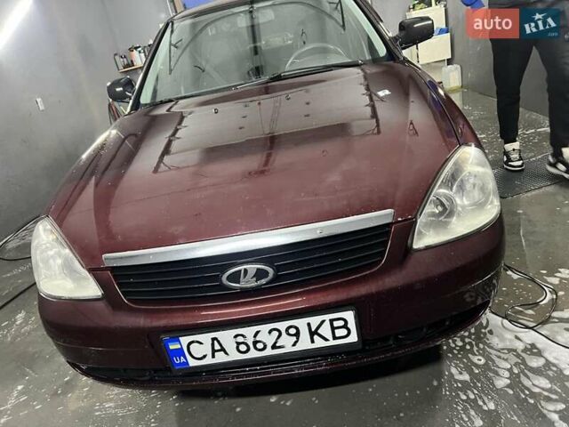 Красный ВАЗ 2170 Priora, объемом двигателя 1.6 л и пробегом 270 тыс. км за 1999 $, фото 1 на Automoto.ua