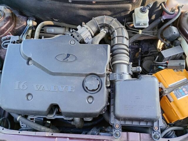 Красный ВАЗ 2170 Priora, объемом двигателя 1.6 л и пробегом 150 тыс. км за 2900 $, фото 1 на Automoto.ua