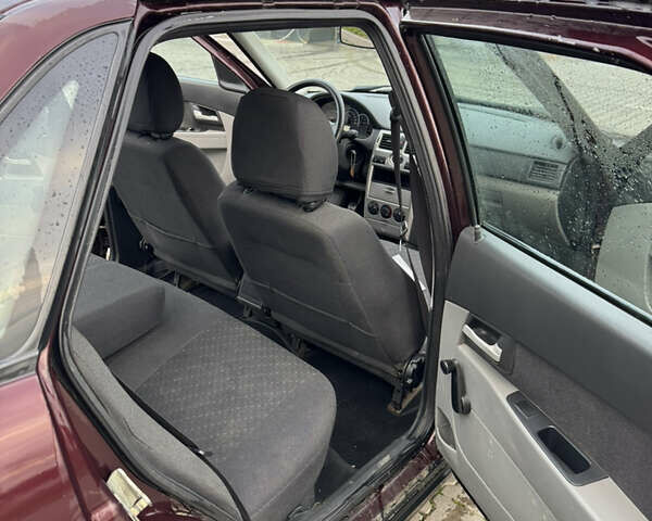 Красный ВАЗ 2170 Priora, объемом двигателя 1.6 л и пробегом 59 тыс. км за 2800 $, фото 8 на Automoto.ua