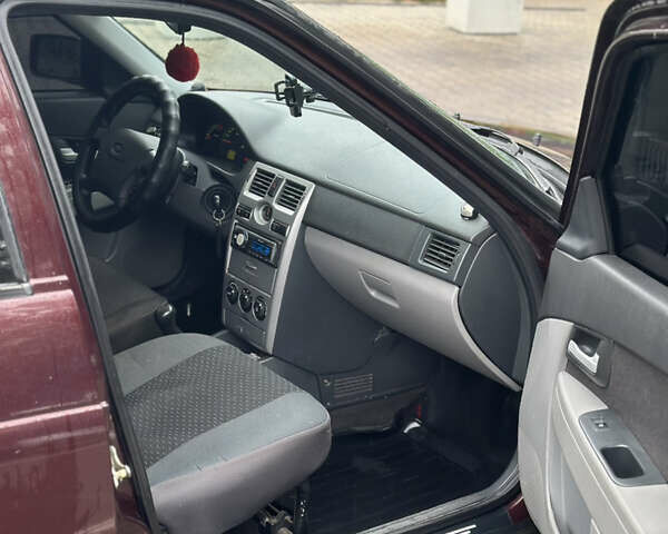 Красный ВАЗ 2170 Priora, объемом двигателя 1.6 л и пробегом 94 тыс. км за 4100 $, фото 9 на Automoto.ua