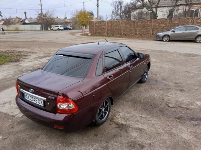 Красный ВАЗ 2170 Priora, объемом двигателя 1.6 л и пробегом 160 тыс. км за 4200 $, фото 2 на Automoto.ua