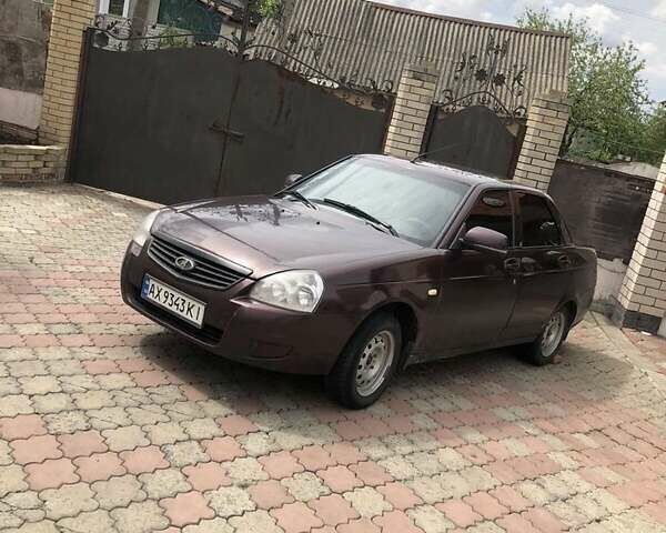 Красный ВАЗ 2170 Priora, объемом двигателя 1.6 л и пробегом 300 тыс. км за 3000 $, фото 1 на Automoto.ua