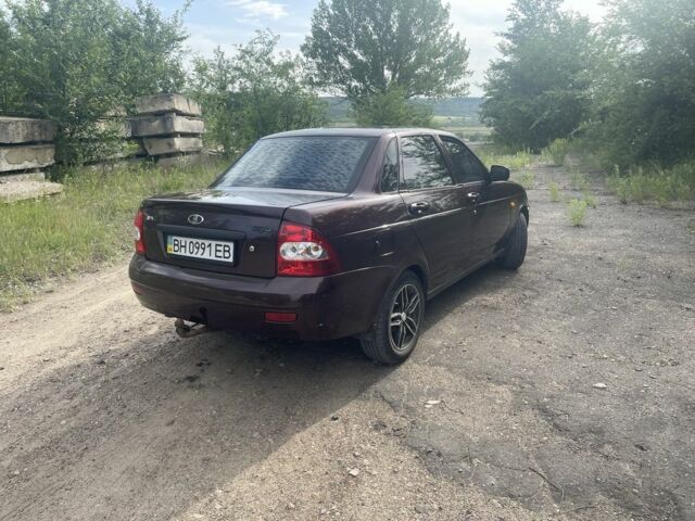 Красный ВАЗ 2170 Priora, объемом двигателя 1.6 л и пробегом 350 тыс. км за 2750 $, фото 1 на Automoto.ua