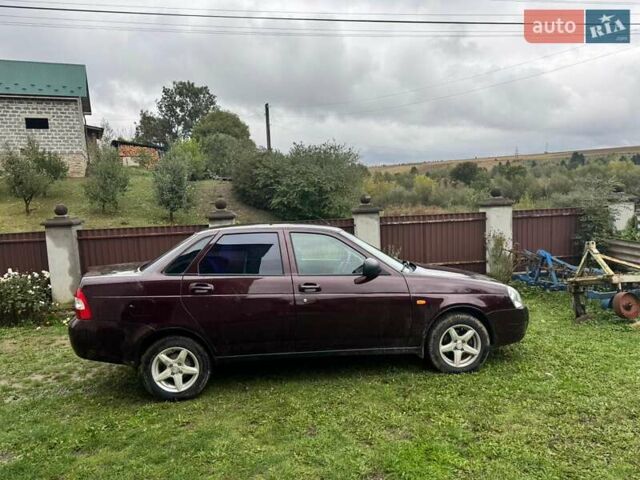 Красный ВАЗ 2170 Priora, объемом двигателя 1.6 л и пробегом 118 тыс. км за 4000 $, фото 1 на Automoto.ua