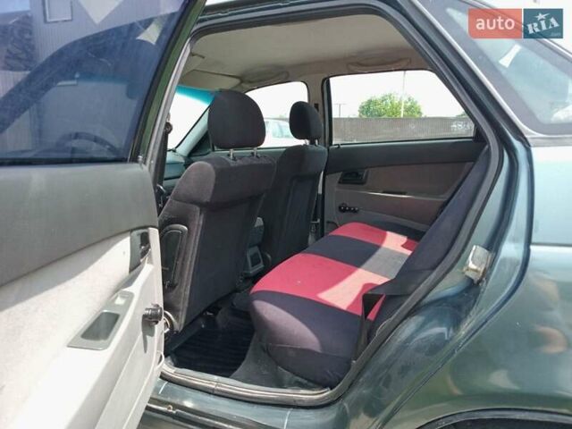 Зеленый ВАЗ 2170 Priora, объемом двигателя 1.6 л и пробегом 179 тыс. км за 1800 $, фото 10 на Automoto.ua