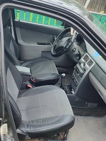 Черный ВАЗ 2171 Priora, объемом двигателя 1.6 л и пробегом 165 тыс. км за 3000 $, фото 7 на Automoto.ua
