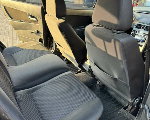 Чорний ВАЗ 2171 Priora, об'ємом двигуна 1.6 л та пробігом 300 тис. км за 2000 $, фото 11 на Automoto.ua