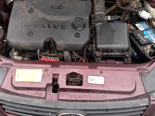 Красный ВАЗ 2171 Priora, объемом двигателя 1.6 л и пробегом 191 тыс. км за 1900 $, фото 5 на Automoto.ua