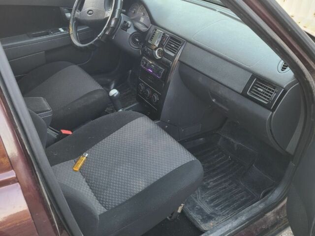 Красный ВАЗ 2171 Priora, объемом двигателя 1.6 л и пробегом 286 тыс. км за 2300 $, фото 5 на Automoto.ua