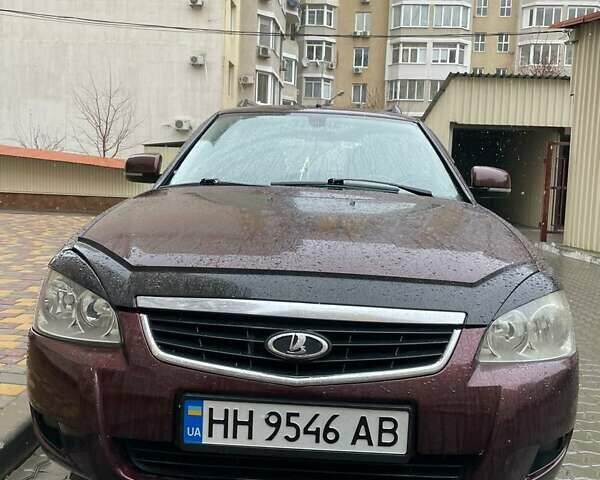 Красный ВАЗ 2171 Priora, объемом двигателя 1.6 л и пробегом 145 тыс. км за 2999 $, фото 1 на Automoto.ua