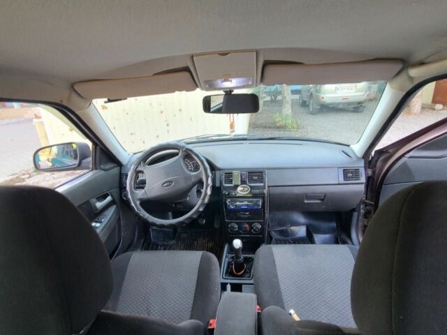 Красный ВАЗ 2171 Priora, объемом двигателя 1.6 л и пробегом 286 тыс. км за 2300 $, фото 7 на Automoto.ua