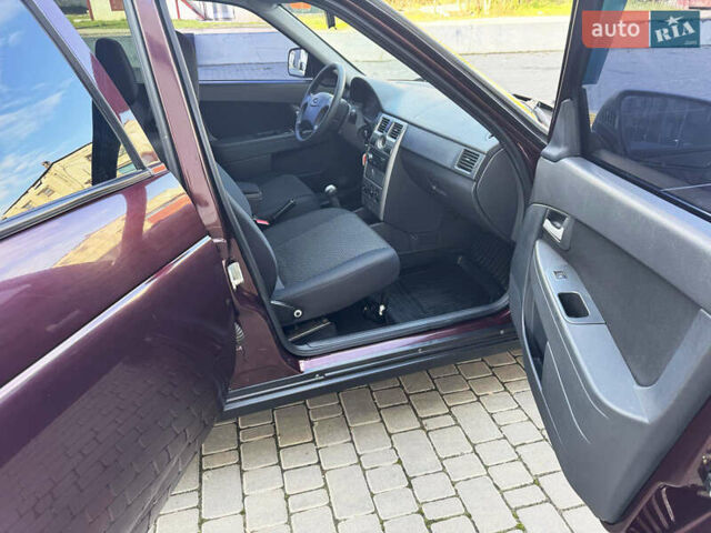 Красный ВАЗ 2171 Priora, объемом двигателя 1.6 л и пробегом 53 тыс. км за 4300 $, фото 12 на Automoto.ua