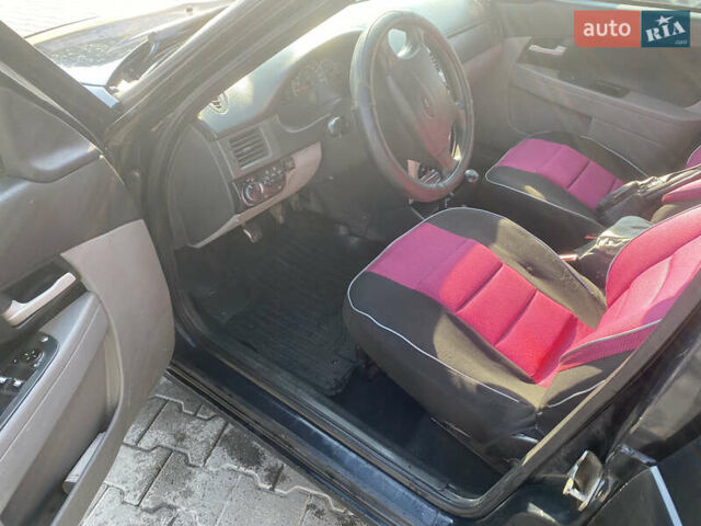 Черный ВАЗ 2172 Priora, объемом двигателя 1.6 л и пробегом 130 тыс. км за 2000 $, фото 16 на Automoto.ua