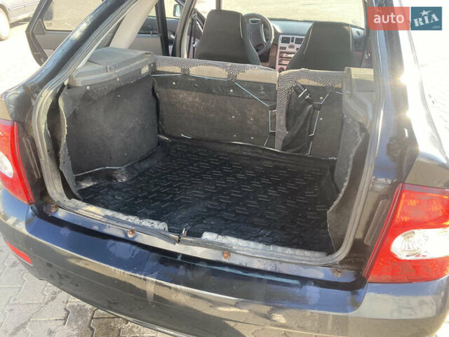 Черный ВАЗ 2172 Priora, объемом двигателя 1.6 л и пробегом 130 тыс. км за 2000 $, фото 18 на Automoto.ua