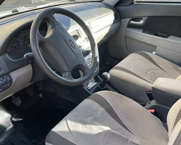 Черный ВАЗ 2172 Priora, объемом двигателя 1.6 л и пробегом 170 тыс. км за 2500 $, фото 4 на Automoto.ua